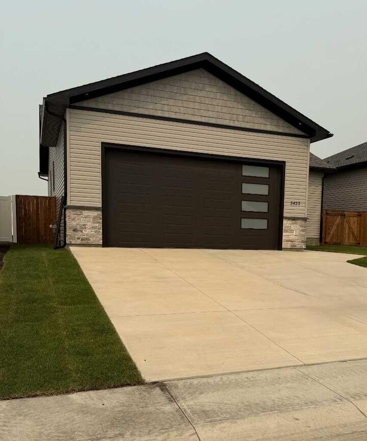 Property Photo: 3422 Victory Way AB T4H 0E4