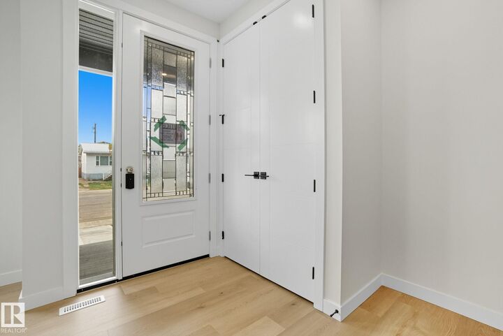 Property Photo:  9007 153 Street NW  AB T5R 1P4