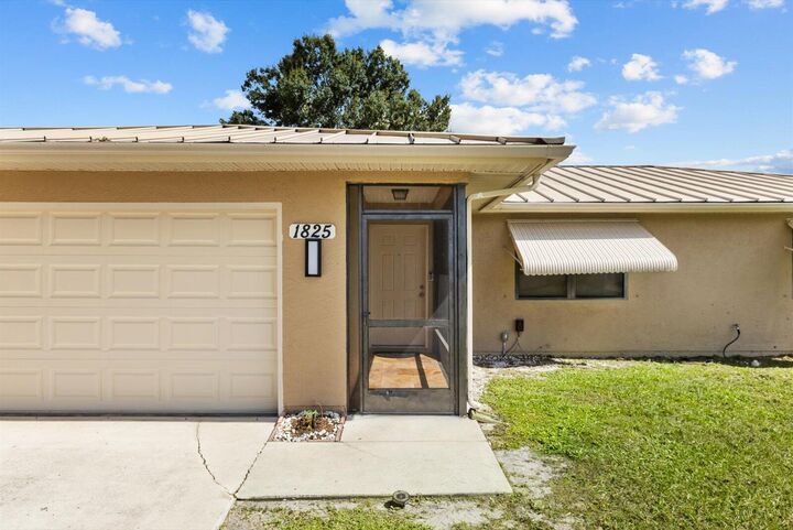 Property Photo: 1825 SW Cameo Boulevard FL 34953
