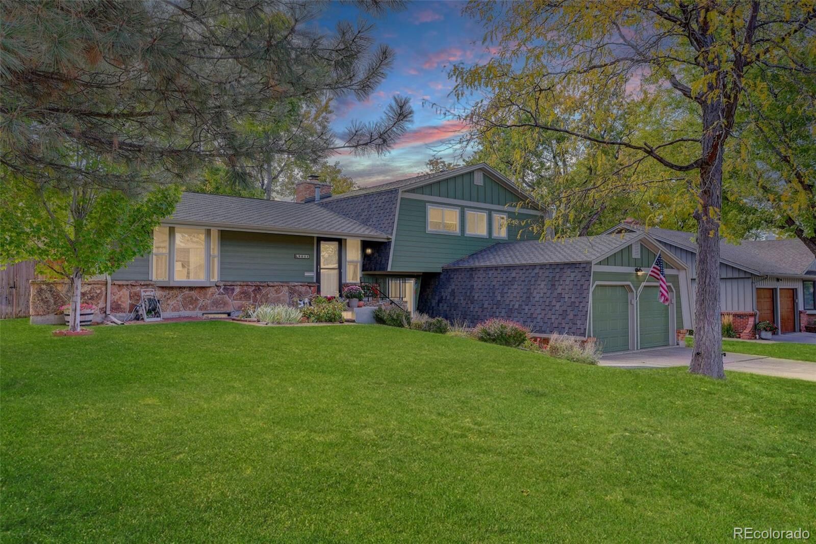 Property Photo: 9044 E Floyd Avenue CO 80231