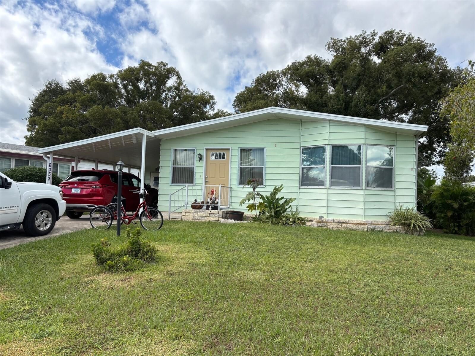 Property Photo:  6033 Grand Oaks Drive SE  FL 33884 