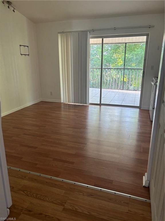 Property Photo:  5386 16th Pl SW F-4  FL 34116 