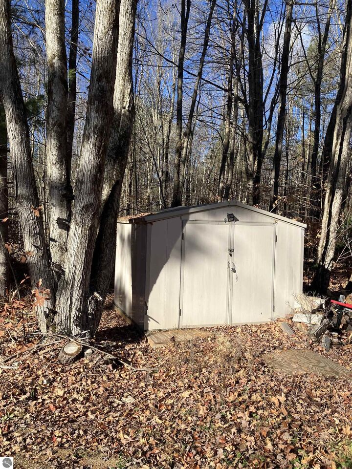 Property Photo:  5616 E Shore  MI 49646 