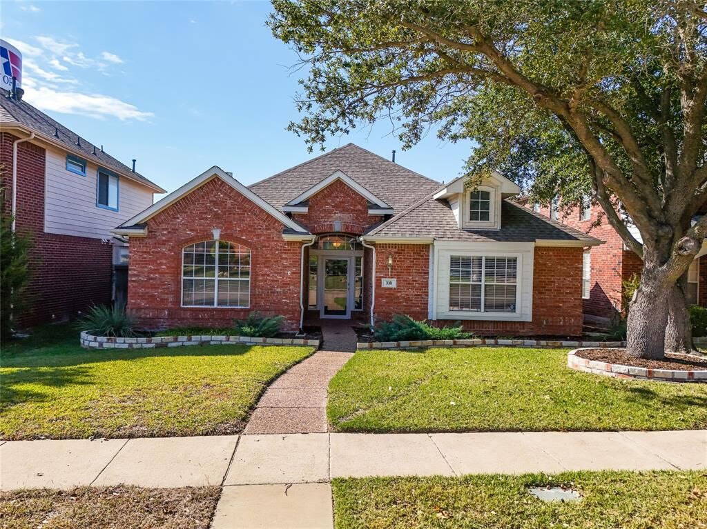 Property Photo: 310 Wrotham Lane TX 75013