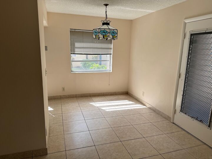 Property Photo:  390 Burgundy I  FL 33484 