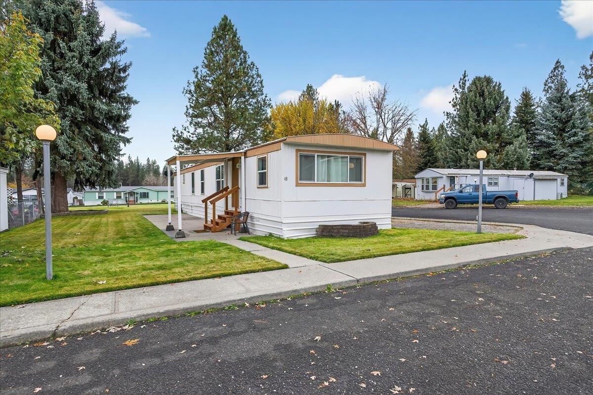 Property Photo: 3110 E Chattaroy Rd 48 WA 99003