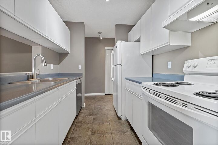 Property Photo:  2508 50 Street NW 304  AB T6L 6X9 