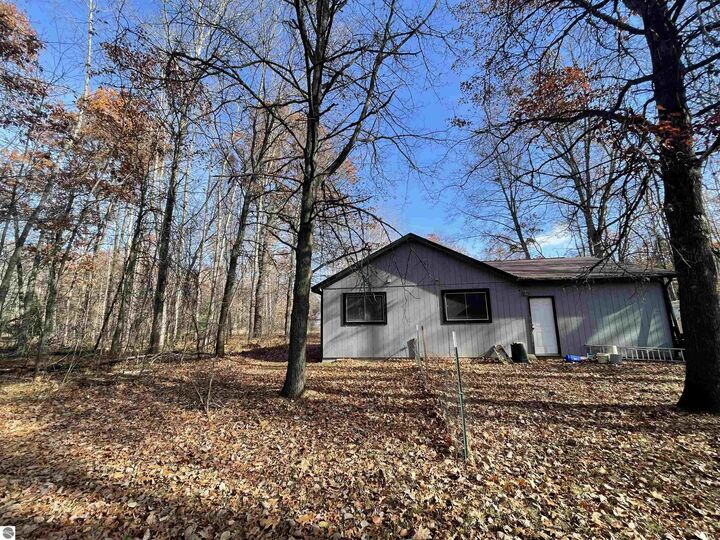 Property Photo:  6667 Shadowbrook Drive  MI 48632 