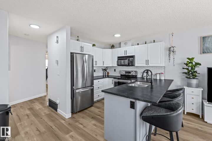 Property Photo:  15 Woodsmere 35  AB T8L 4S2 