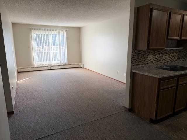 Property Photo: 27 Bennett Street 103 AB T4R 1V3