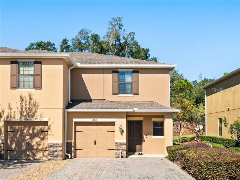 Property Photo: 628 Joyful Blossom Place FL 32750