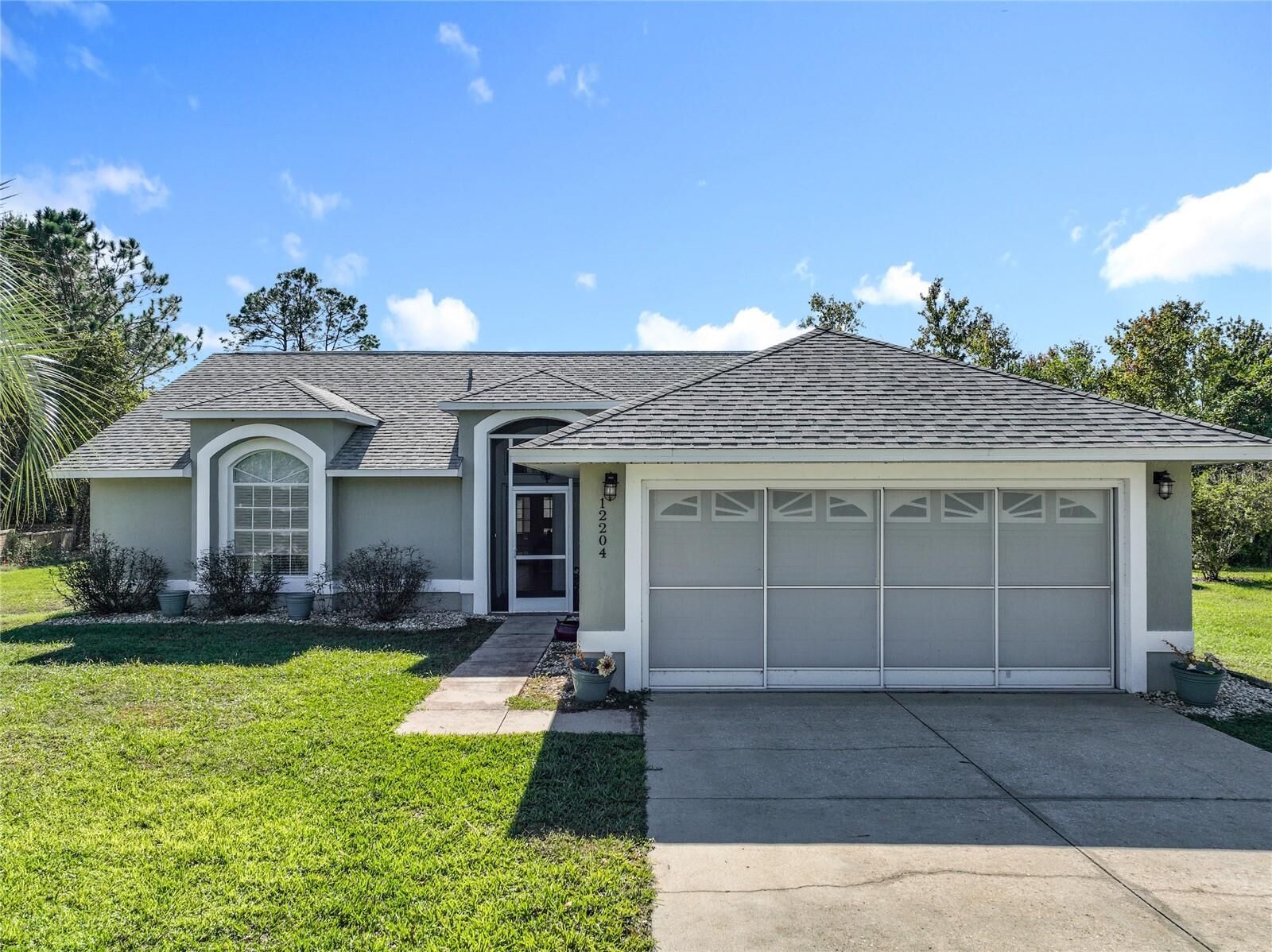 Property Photo:  12204 Wedgefield Drive  FL 32735 