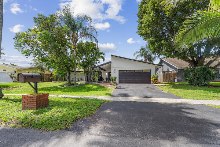 Property Photo:  1620 NW 118th Avenue  FL 33026 