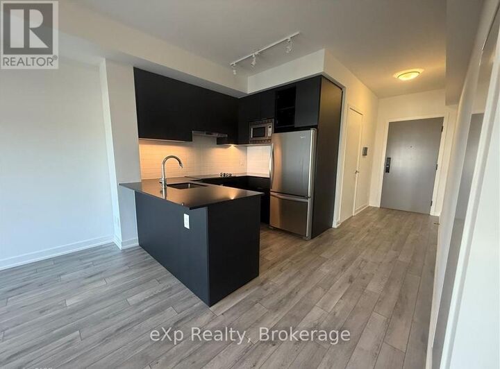 Property Photo:  3079 Trafalgar Road 305  ON L6H 8C5 