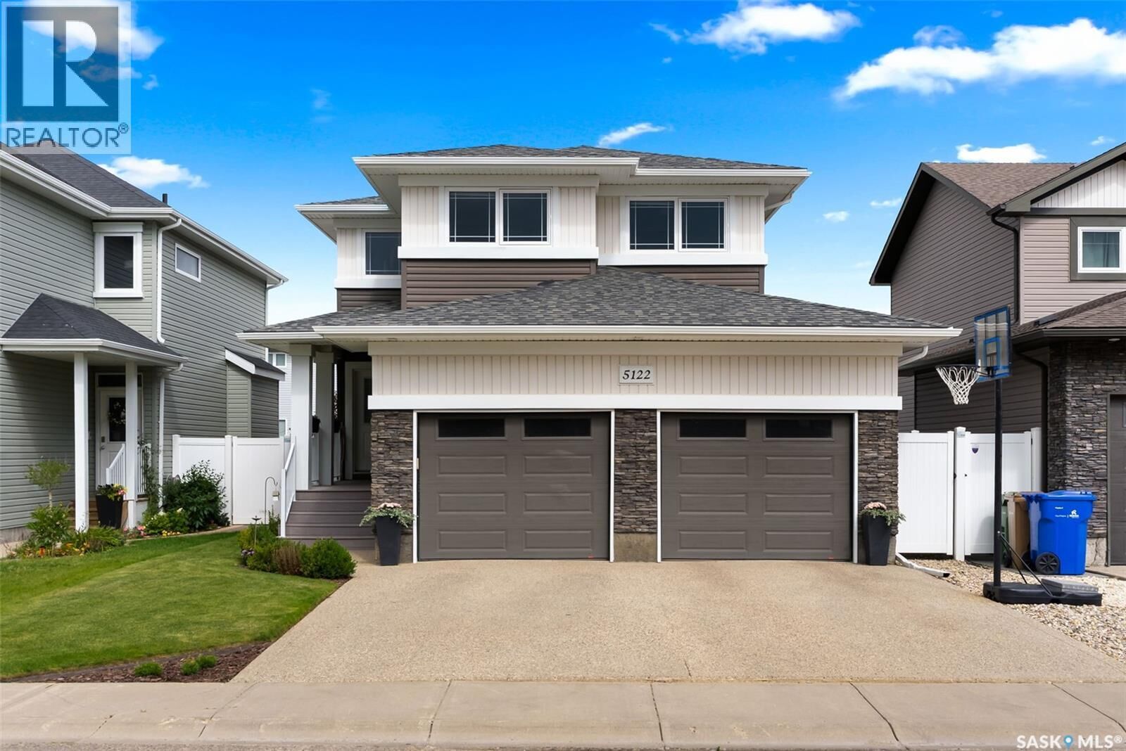 Property Photo: 5122 Snowbirds Crescent SK S4W 0H4