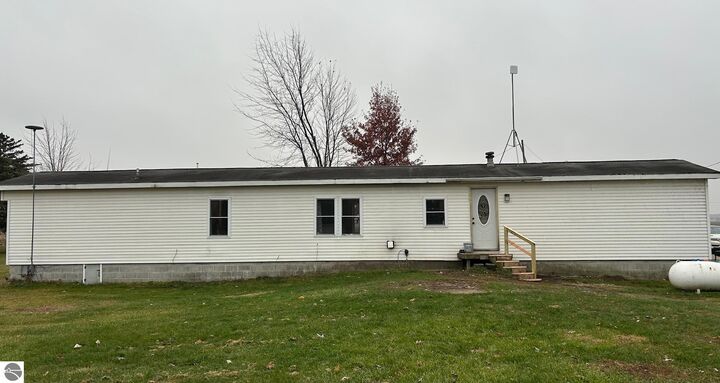 Property Photo:  3780 E North County Line Road  MI 48880 