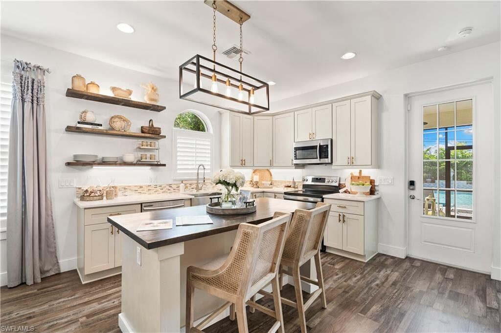 Property Photo:  3060 Woodside Ave  FL 34112 