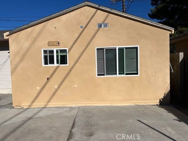 Property Photo:  9659 Woodruff Ave B  CA 91780 