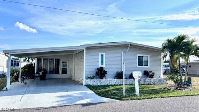 Property Photo:  5545 Sir Walter Way  FL 33917 