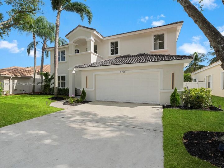 Property Photo:  6758 Lake Nona Pl  FL 33463 