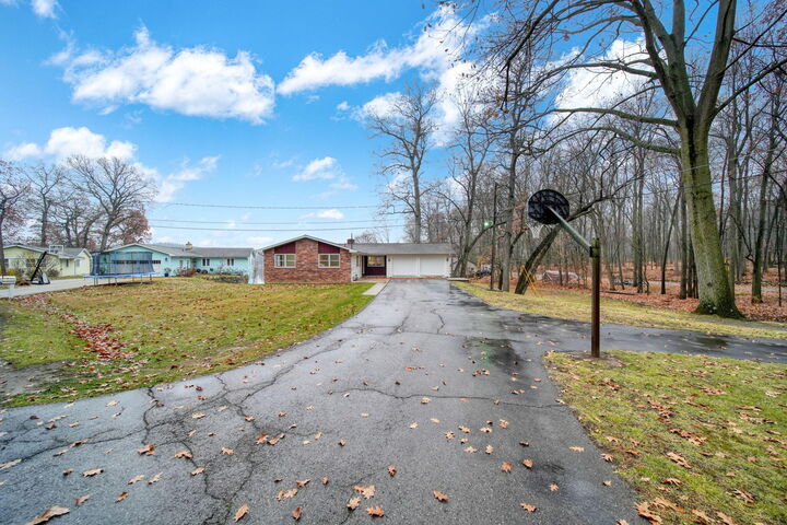 Property Photo:  385 Wood Hills Drive  MI 49237 