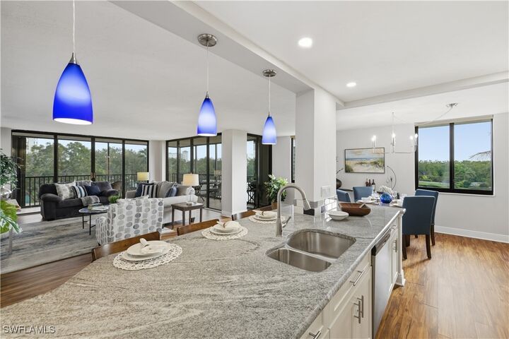 Property Photo:  11 Bluebill Avenue 201  FL 34108 