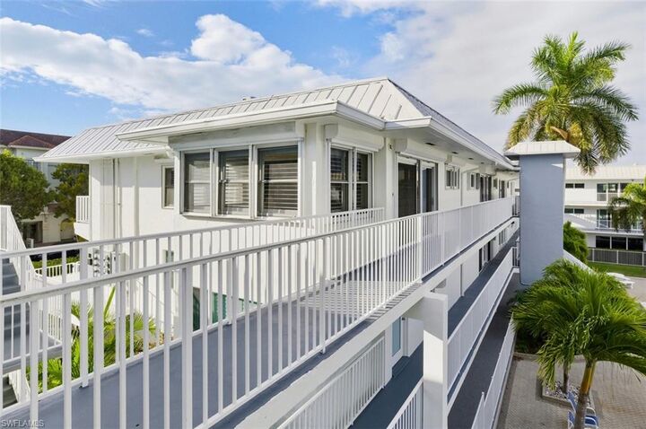 Property Photo:  1100 8th Ave S 309C  FL 34102 