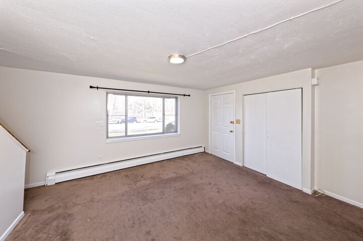 Property Photo:  4 Bishop Dr 4  MA 01702 