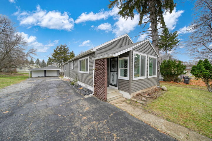 Property Photo:  328 Adams Street  MI 49202 