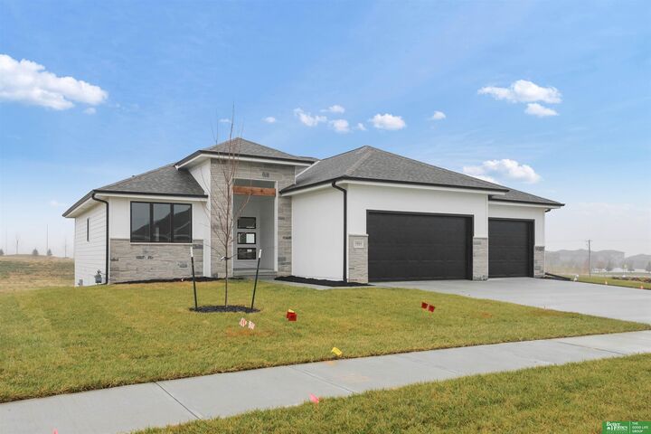 Property Photo: 10664 S 103rd Street NE 68046