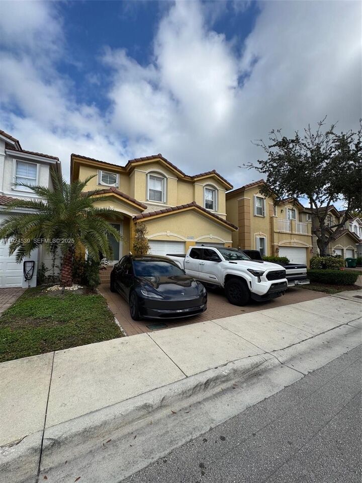 Property Photo:  11027 NW 87th Ln  FL 33178 