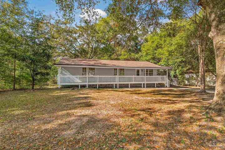 Property Photo: 4771 Carl Booker Rd FL 32583