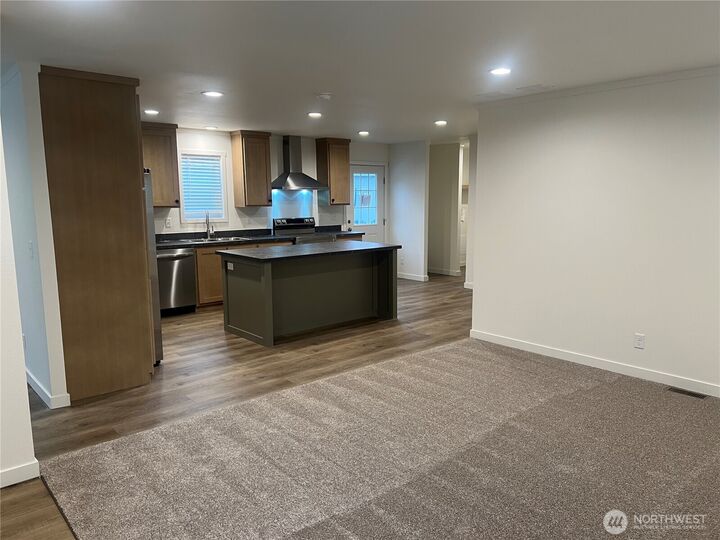 Property Photo: 6118 161st Street Ct E 228 WA 98375