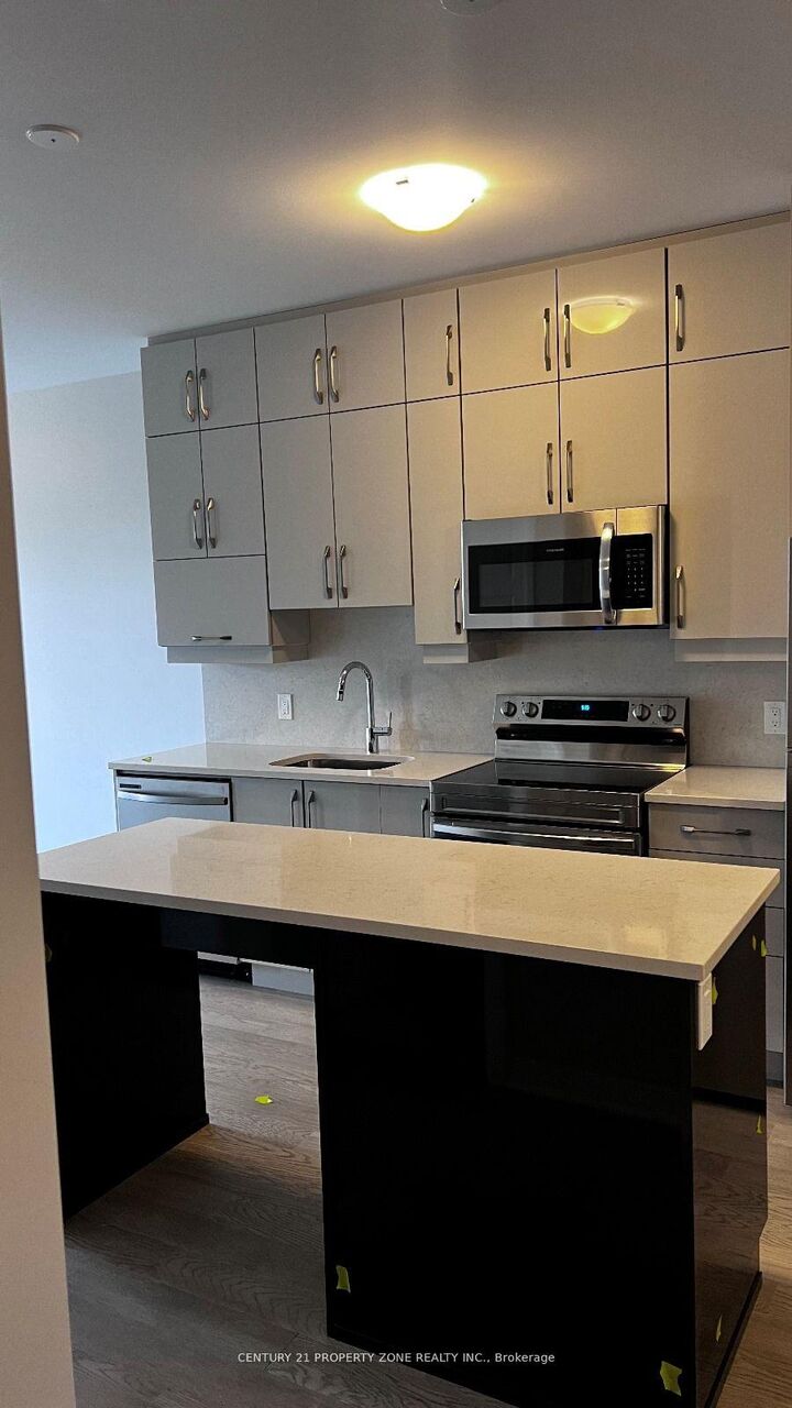 Property Photo: 460 Gordon Krantz Avenue 204 ON L9E 1Z2