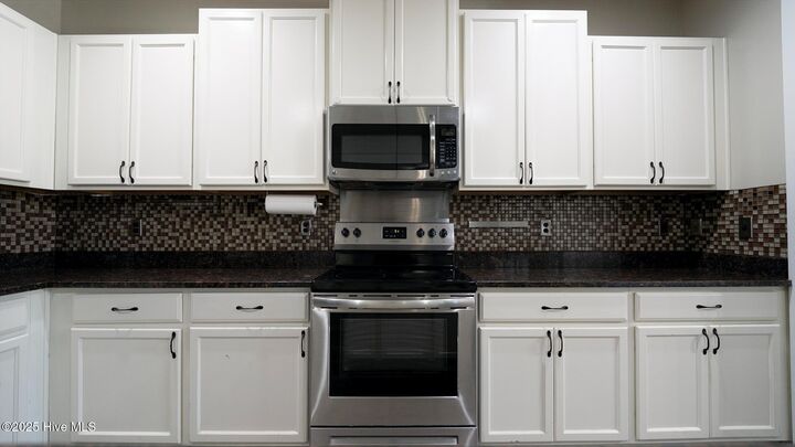 Property Photo:  402 Ponzer Court N  NC 28445 