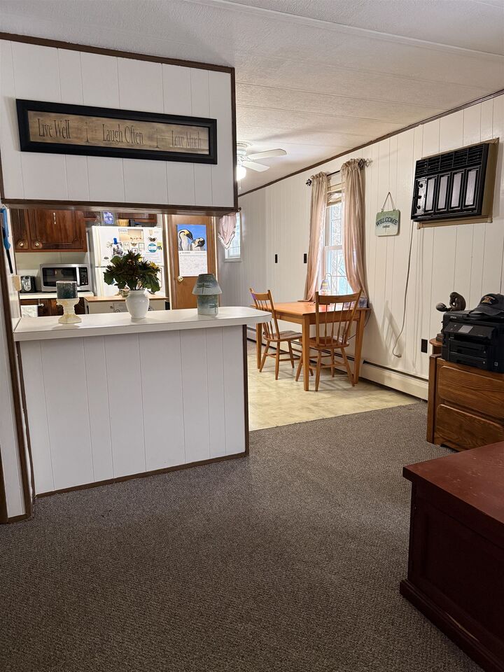 Property Photo: 1013 Camelot Drive NH 03833