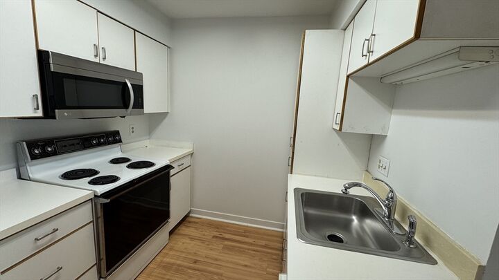 Property Photo:  100 Rosemary Way 129  MA 02494 