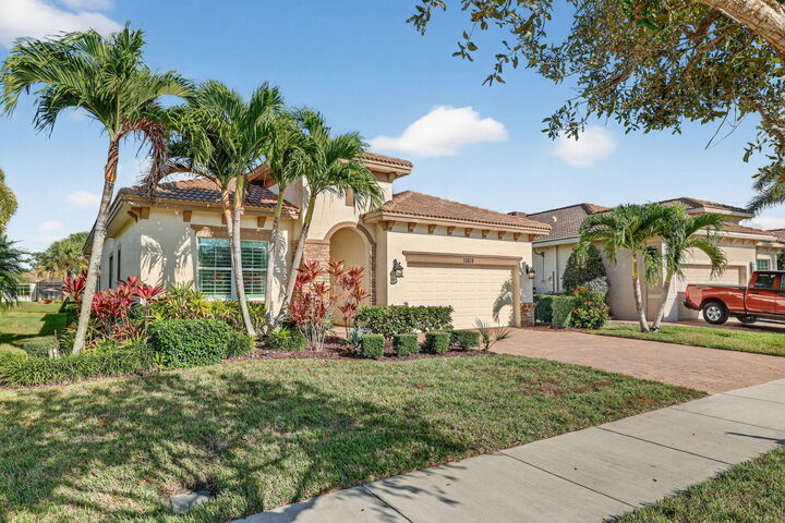 Property Photo: 10619 SW Capraia Way FL 34986