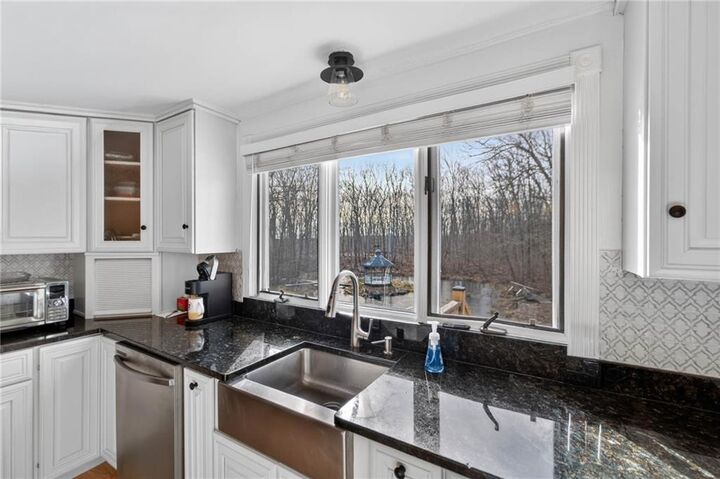 Property Photo:  94 Quaker Lane  RI 02857 