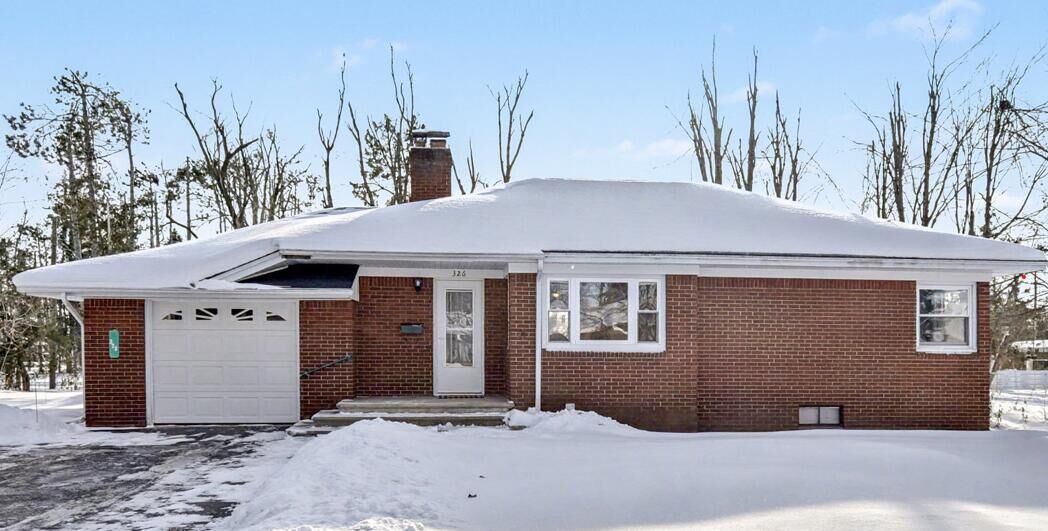 Property Photo: 326 E Sheldon Street MI 49735