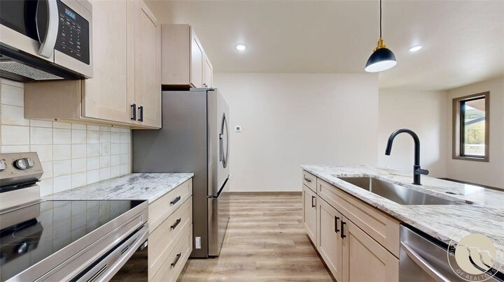 Property Photo:  1125 Adams Ave S. 10  MT 59068 