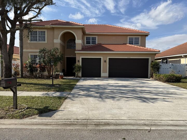 Property Photo: 7065 Catalina Isle Drive FL 33467