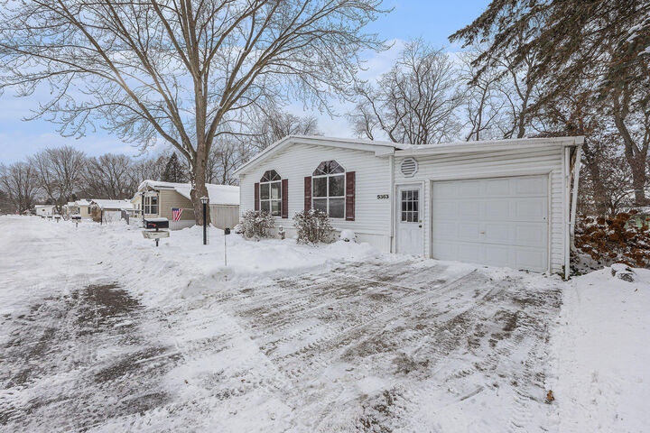 Property Photo: 5363 Chickadee Drive NE MI 49306