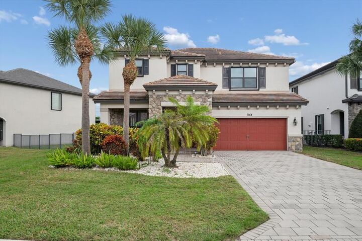 Property Photo:  7164 Sandgrace Ln  FL 33463 