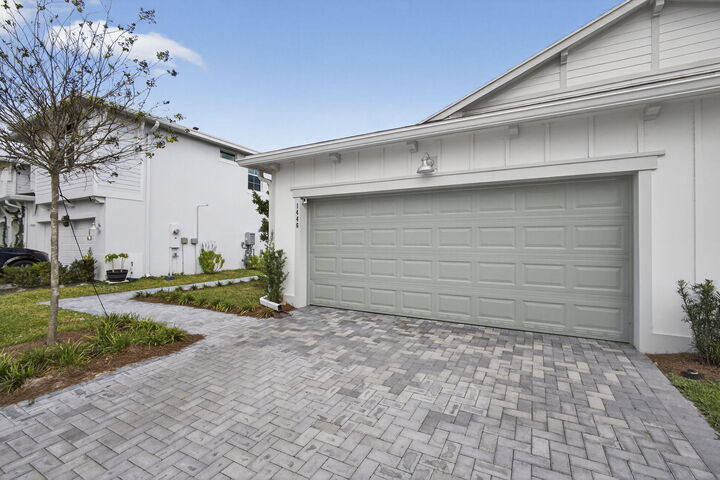 Property Photo:  1446 Tangled Orchard Trace  FL 33470 