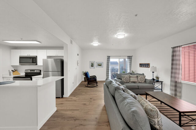 Property Photo:  165 W Albion Village Way 202  UT 84070 