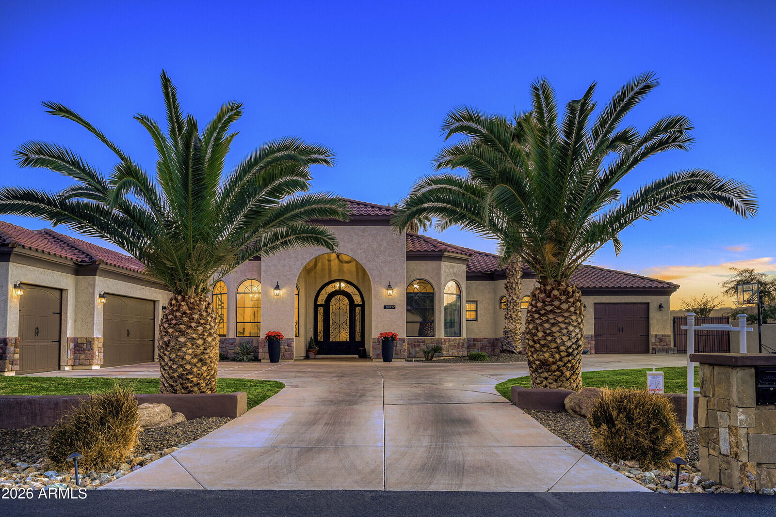 Property Photo:  18037 W San Juan Avenue  AZ 85340 