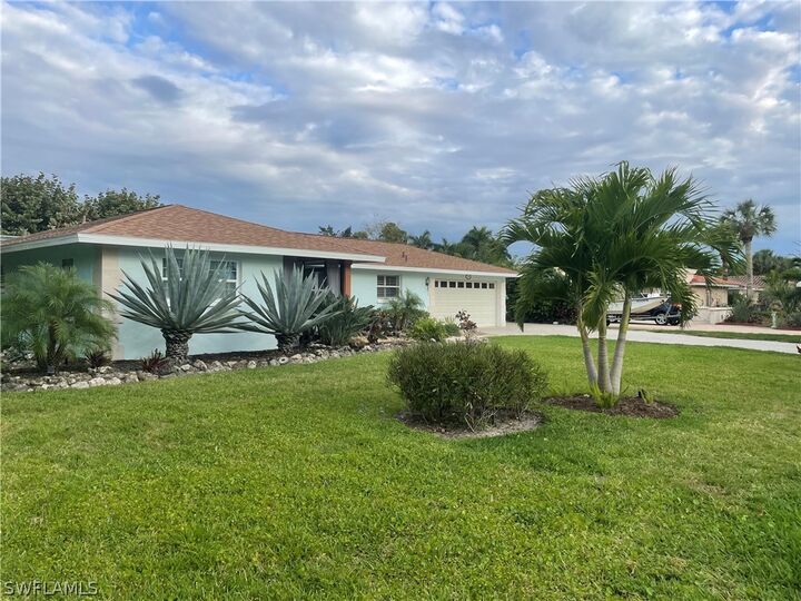 Property Photo:  27061 Homewood Drive  FL 34135 