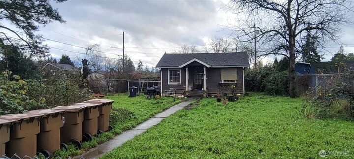 Property Photo:  830 E 66th Street  WA 98404 