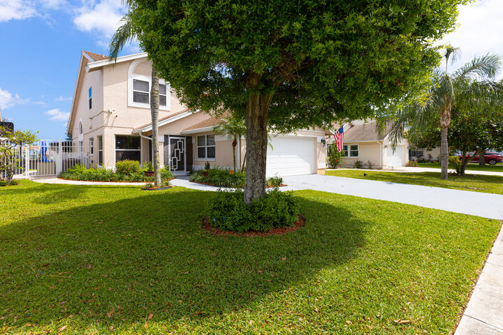 Property Photo:  3875 Circle Lake Drive  FL 33417 